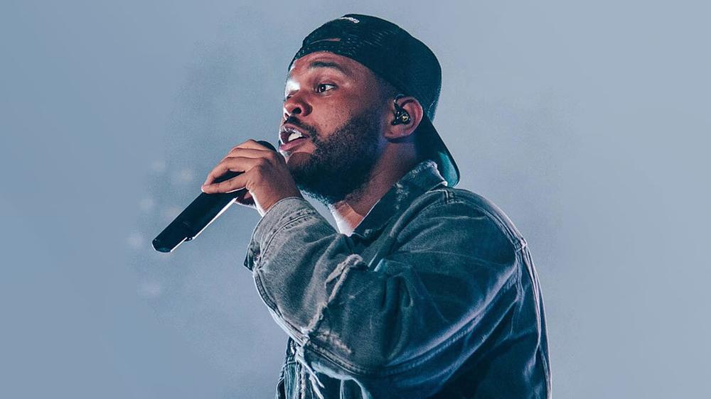 The Weeknd во время выступления, июль 2018 года