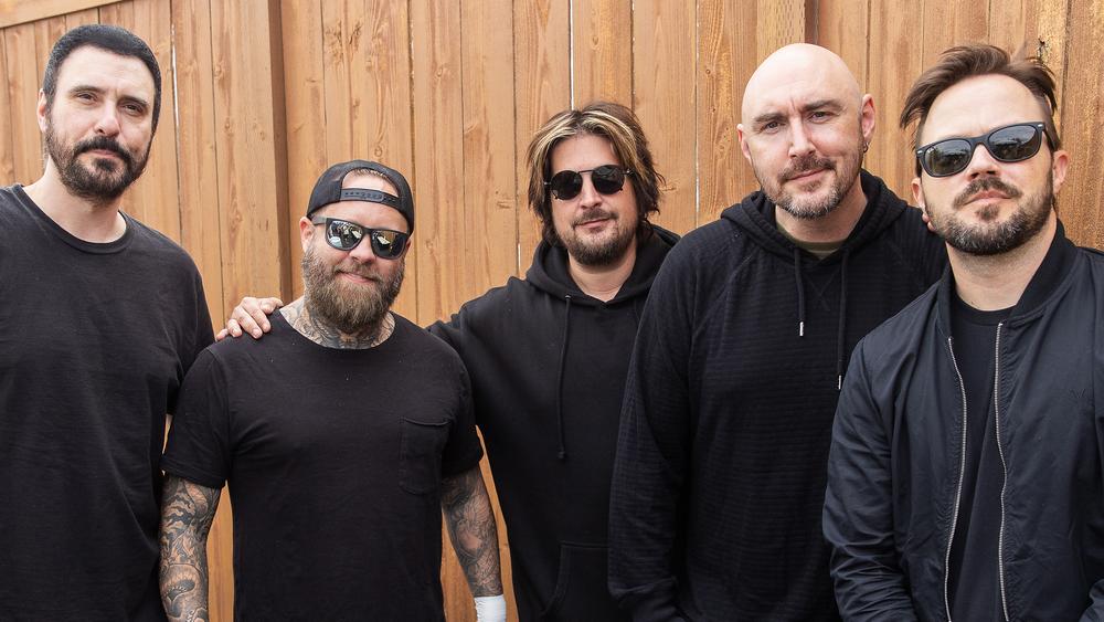 Участники группы Breaking Benjamin на фестивале Pain In The Grass, 3 сентября 2022 года